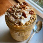 Pumpkin Overnight Oats – 5-Min Fall Breakfast You’ll Love 7 Pumpkin overnight oats in a mason jar topped with whipped cream and chopped pecans