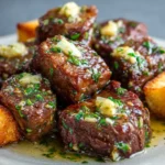 Crockpot Garlic Butter Steak Bites Recipe That Melts in Your Mouth 6 uicy garlic butter steak bites close-up on plate