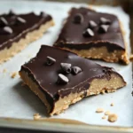 5-Ingredient Cookie Dough Bark – Remarkable Treat in 7 Minutes 8 Chocolate chip 5-ingredient cookie dough bark on white parchment paper