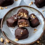 5-Ingredient Snickers Date Bites – Better Than Candy | 5-Minute Treat 8 Filled dates with peanut butter and peanuts before chocolate coating