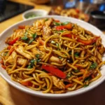 Garlic Chicken Lo Mein – The Ultimate Easy Weeknight Obsession 7 Full bowl of Garlic Chicken Lo Mein with glazed noodles, chicken, and vegetables
