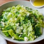 Maroulosalata Greek Lettuce Salad – Top 1 Fresh Favorite Recipe Now 7 Maroulosalata Greek lettuce salad topped with feta and dill, lemon dressing about to be poured