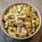 Matthew McConaughey Tuna Salad – 1 Viral Star Recipe You'll Love 7 Matthew McConaughey Tuna Salad in a bowl with diced green apple, red onion, jalapeños, and creamy dressing